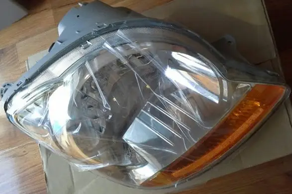 Đèn Pha Xe Spark 2009