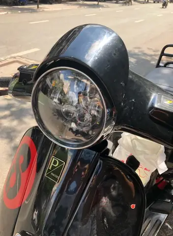 Giá Đèn Pha Xe Vespa Lx